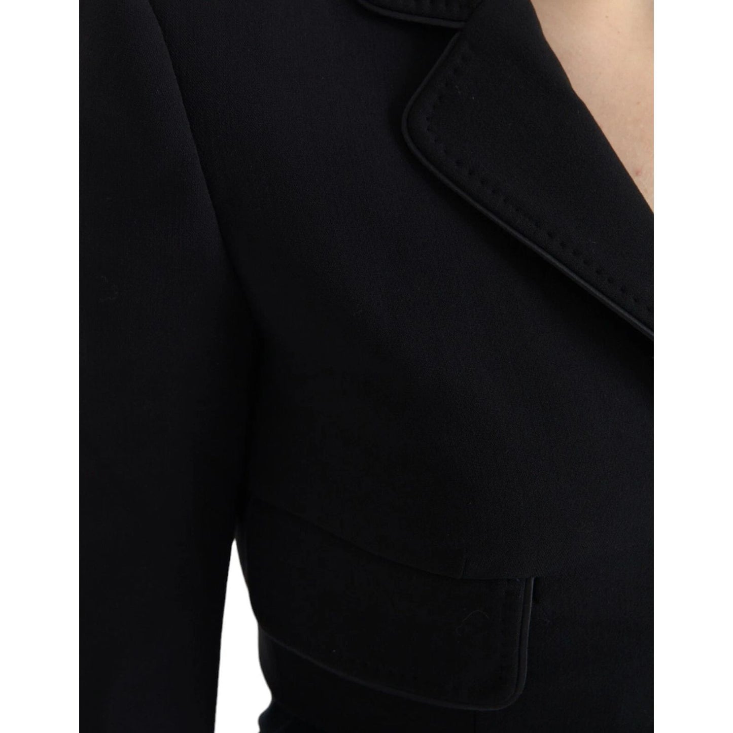 Close-up of Dolce & Gabbana Black Wool Single Breasted Cropped Jacket with notch lapels and front flap pockets.