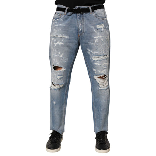 Dolce & Gabbana Blue Distressed Ripped Denim Pants Jeans, stylish streetwear, heavily distressed, Italian design, logo plaque visible.