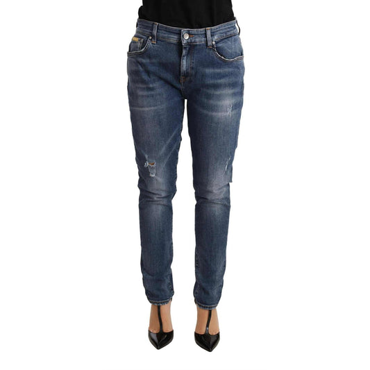 Dolce & Gabbana Blue Distressed Slim Fit Denim Pants Jeans for women, featuring premium stretch denim and leather logo detail.