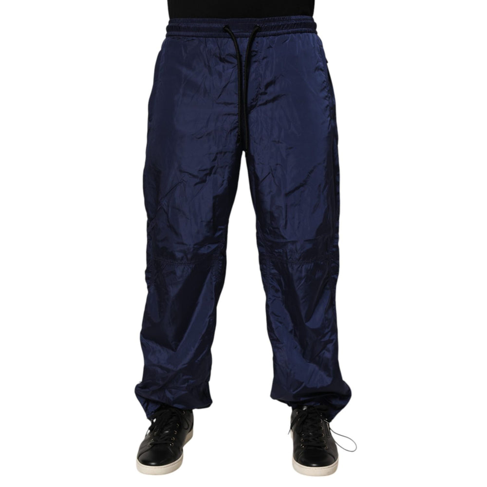 Dolce & Gabbana Blue Nylon Straight Jogger Sweatpants Pants, featuring a sleek design with elastic waistband and side pockets.