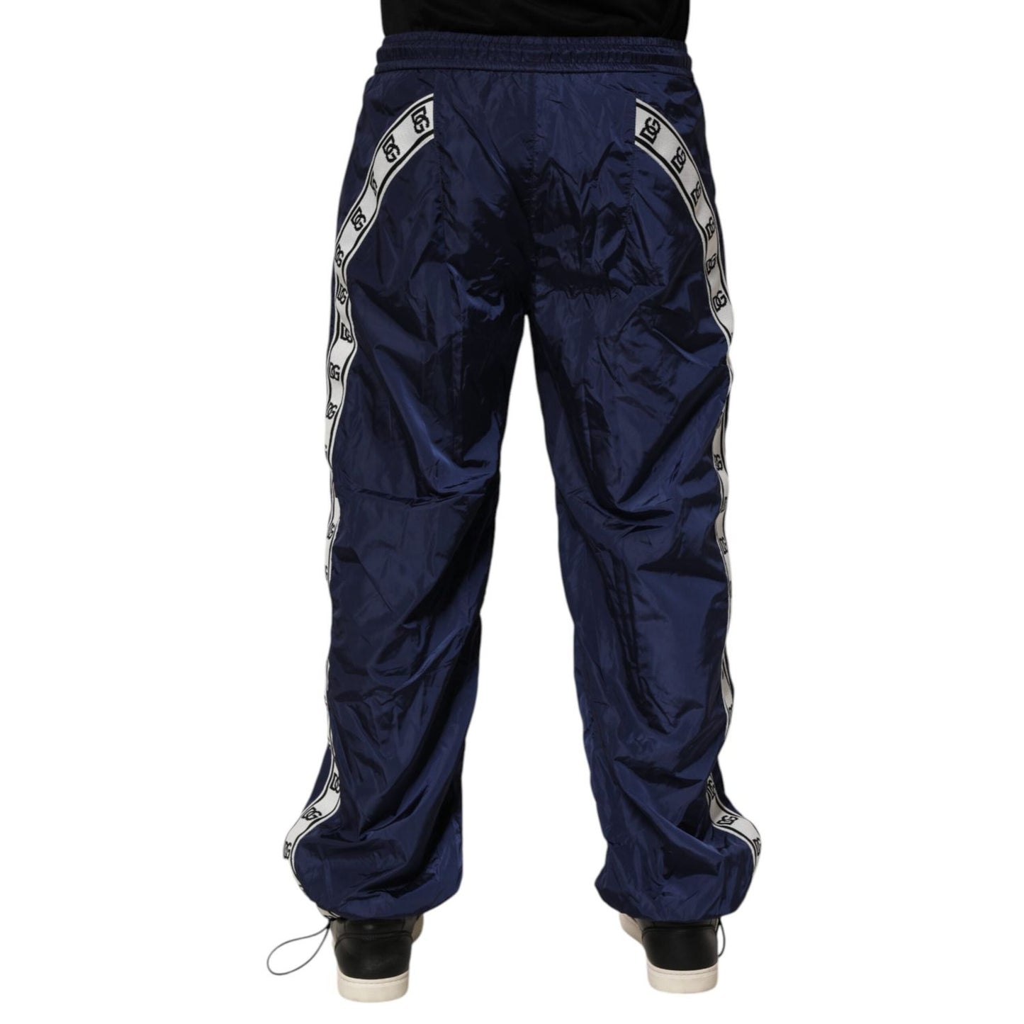 Dolce & Gabbana Blue Nylon Straight Jogger Sweatpants Pants with logo detailing, showcasing back view with elastic waistband and pockets.