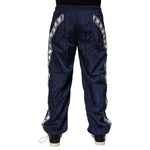 Dolce & Gabbana Blue Nylon Straight Jogger Sweatpants Pants with logo detailing, showcasing back view with elastic waistband and pockets.