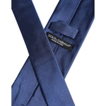 Dolce & Gabbana Blue Solid Silk Adjustable Necktie Tie with logo label, 100% silk, made in Italy, 6cm width, elegant men's accessory.