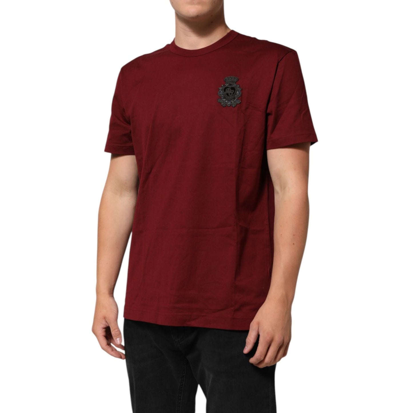 Dolce & Gabbana Bordeaux Red Cotton Crest Logo Patch T-Shirt with black embroidered crest on a male model.