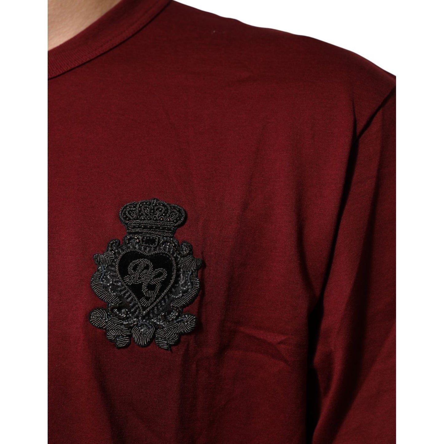 Dolce & Gabbana Bordeaux Red Cotton Crest Logo Patch T-Shirt with black embroidered crest on chest, short sleeve, crew neck.