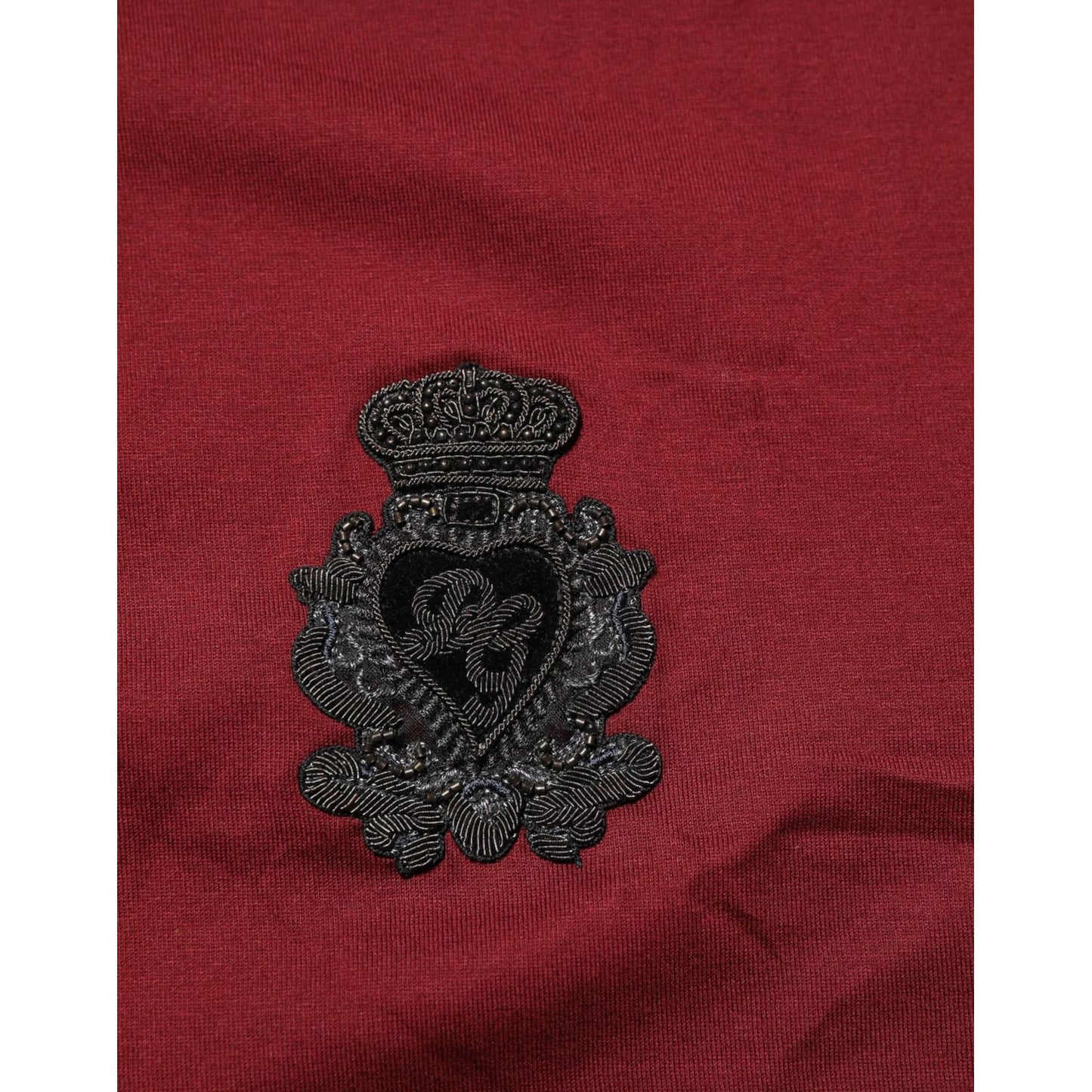 Dolce & Gabbana Bordeaux Red Cotton Crest Logo Patch T-Shirt with black embroidered crest logo patch on chest.