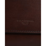 Dolce & Gabbana Brown Leather Logo Embossed Crossbody Bag showing embossed logo detail