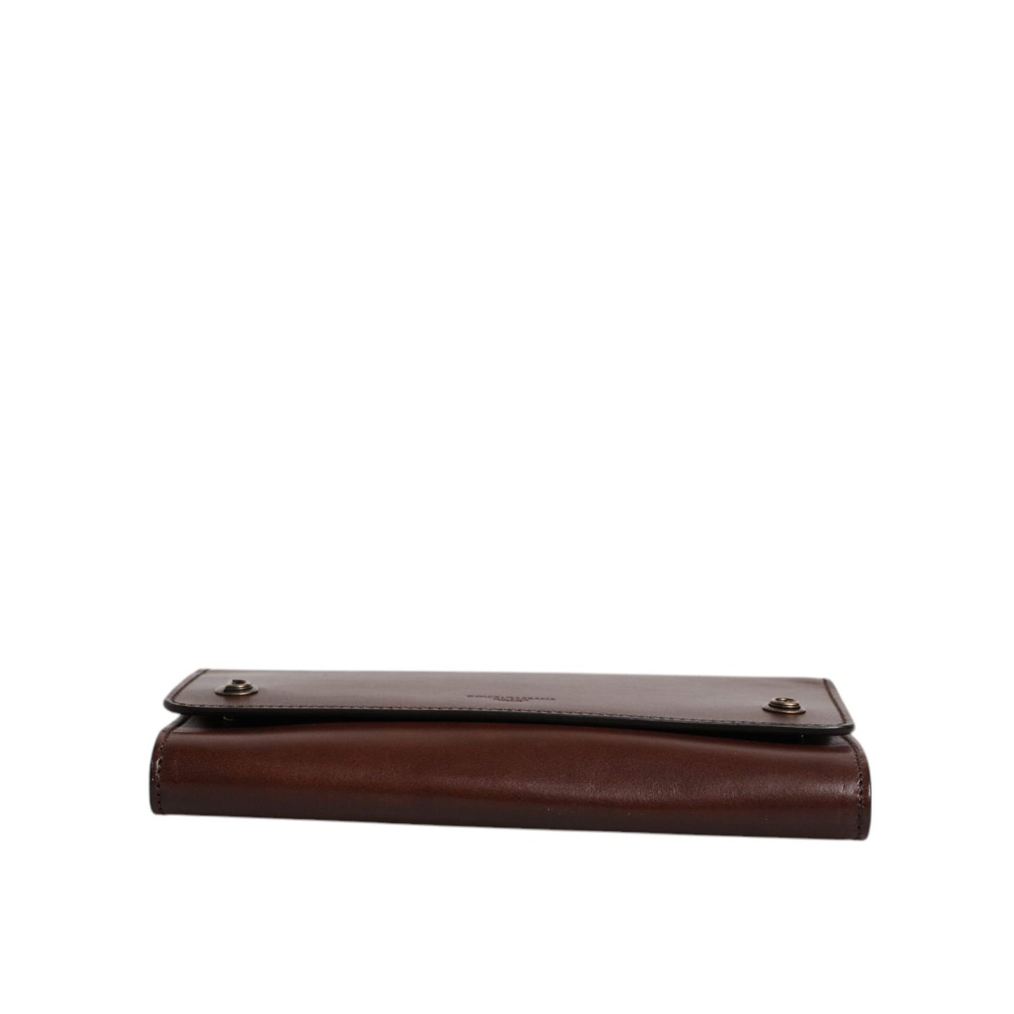 Side view of Dolce & Gabbana Brown Leather Logo Embossed Crossbody Bag with gold detailing.