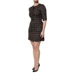 Dolce & Gabbana Brown Tweed Short Sleeves A-line Mini Dress on model, showcasing exclusive Italian craftsmanship with button detail.