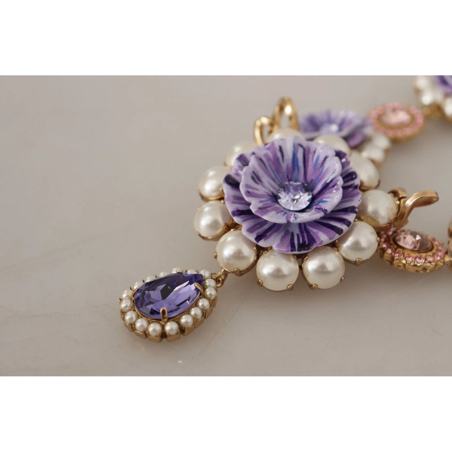 Dolce & Gabbana Gold Tone Floral Crystals Purple Embellished necklace with pearl beads and purple floral charms close-up.