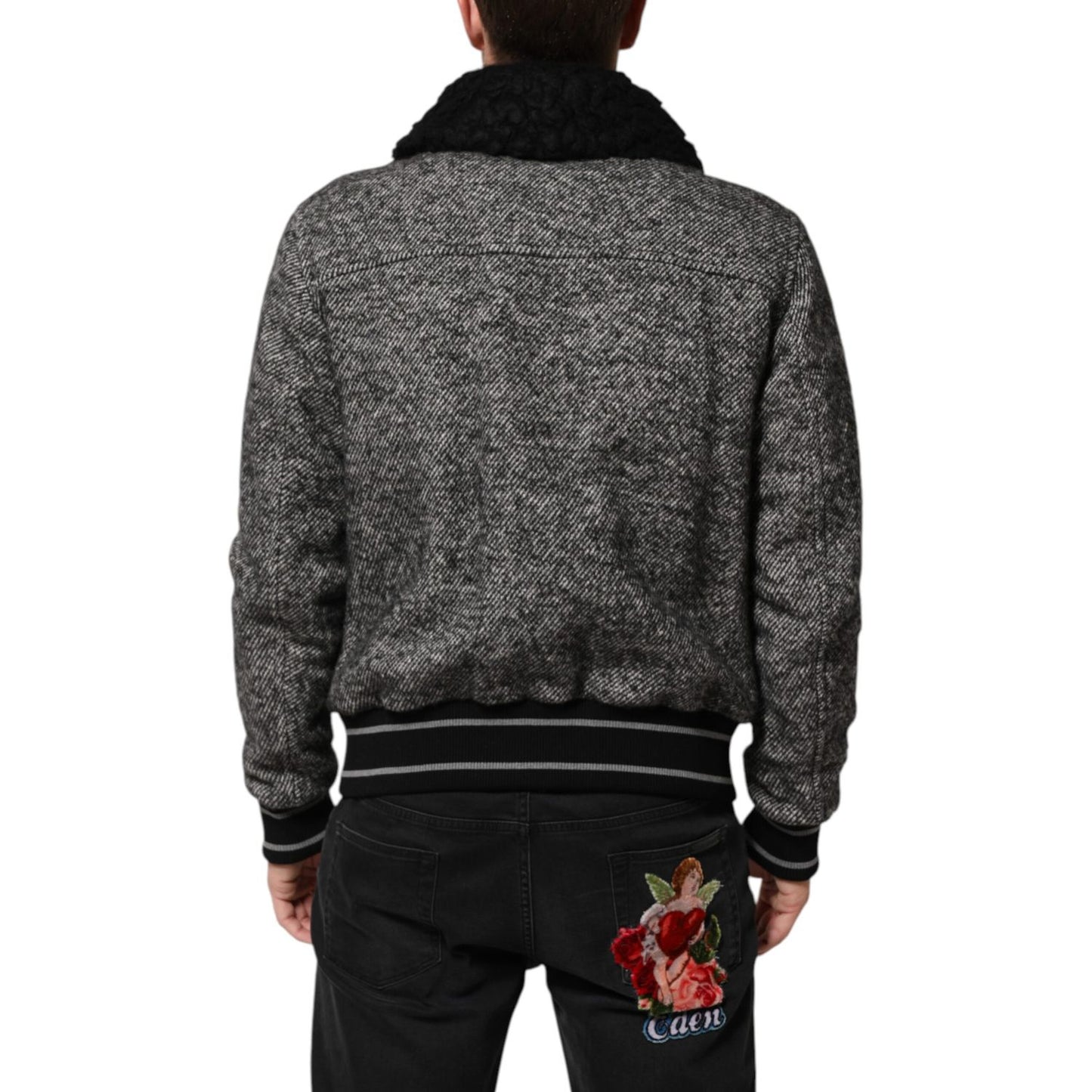 Back view of a Dolce & Gabbana Gray Wool Herringbone Shearling Collar Bomber Jacket with black shearling collar and ribbed cuffs.