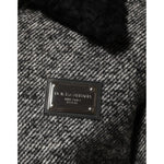 Close-up of Dolce & Gabbana Gray Wool Herringbone Shearling Collar Bomber Jacket with logo patch detail.