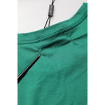 Close-up of Dolce & Gabbana Green Cotton Graphic Logo Print Crewneck T-shirt, highlighting fabric details and craftsmanship.
