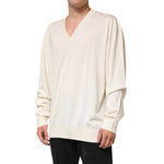 Dolce & Gabbana Ivory Virgin Wool Men V-Neck Knit Sweater display, off-white premium fabric, breathable and lightweight design.