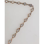 Dolce & Gabbana Lapel Pin DG Logo Gold Chain Mens Accessories Brooch close-up with crystal detail.