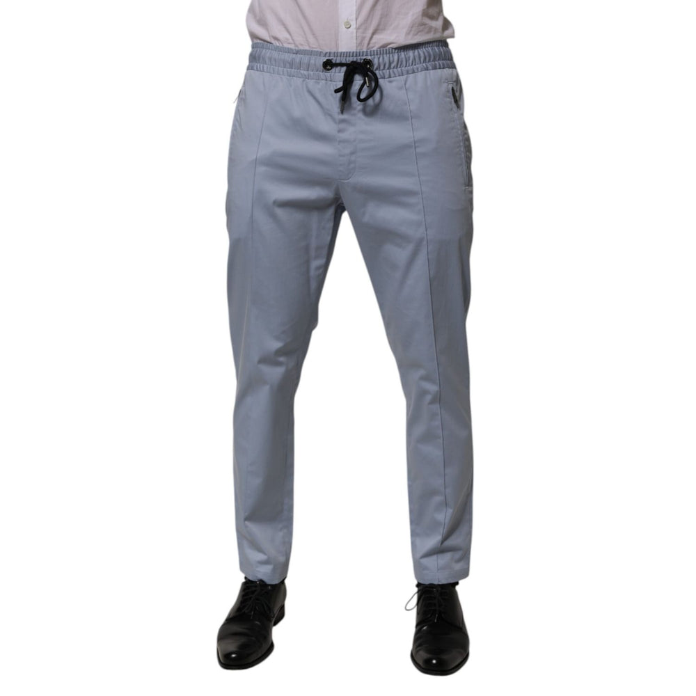 Dolce & Gabbana Light Blue Cotton Drawstring Elastic Waist Men Pants with slim tailored fit, shown with black shoes and white shirt.