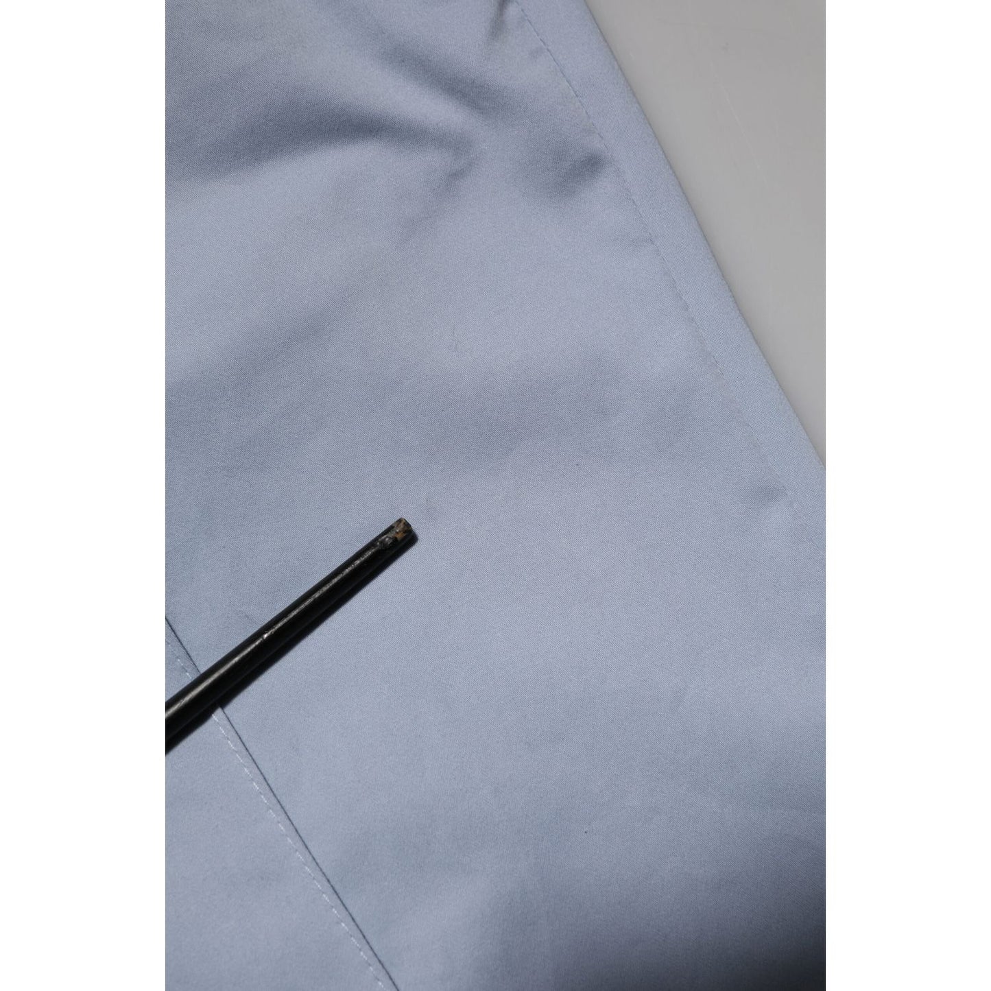 Dolce & Gabbana Light Blue Cotton Drawstring Elastic Waist Men Pants close-up of fabric texture and stitching detail.