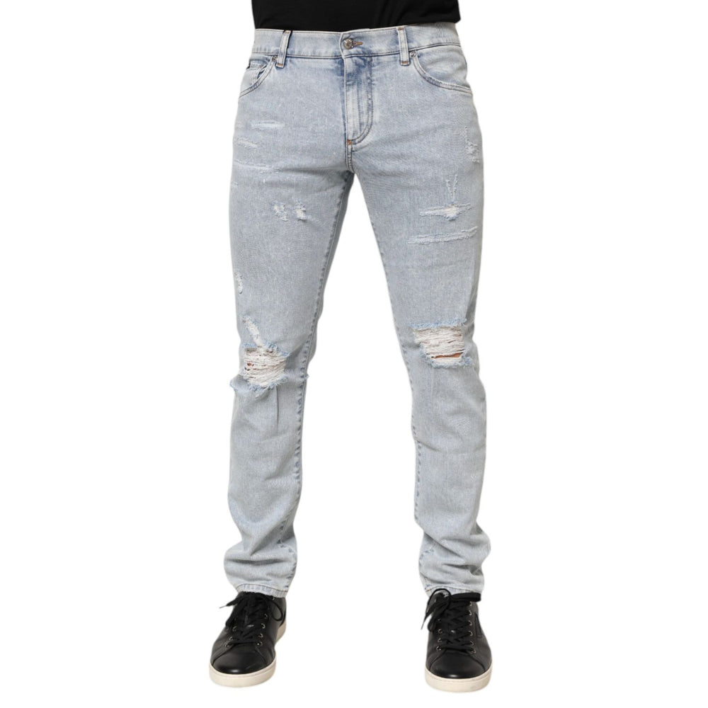 Dolce & Gabbana Light Blue Distressed Slim Fit Ripped Denim Jeans on model showcasing the trendy edgy design.