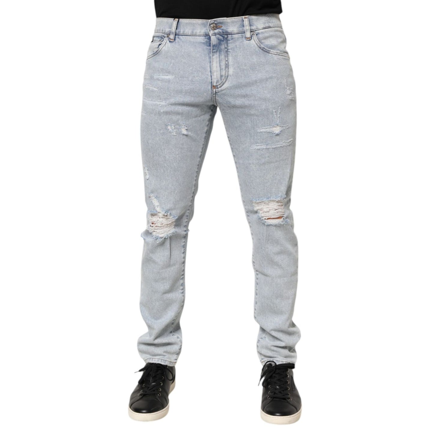Dolce & Gabbana Light Blue Distressed Slim Fit Ripped Denim Jeans showcasing trendy ripped design and slim straight leg cut.
