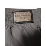 Dolce & Gabbana Light Gray Nylon Elastic Waist Shorts Swimwear with brand logo patch on waistband.