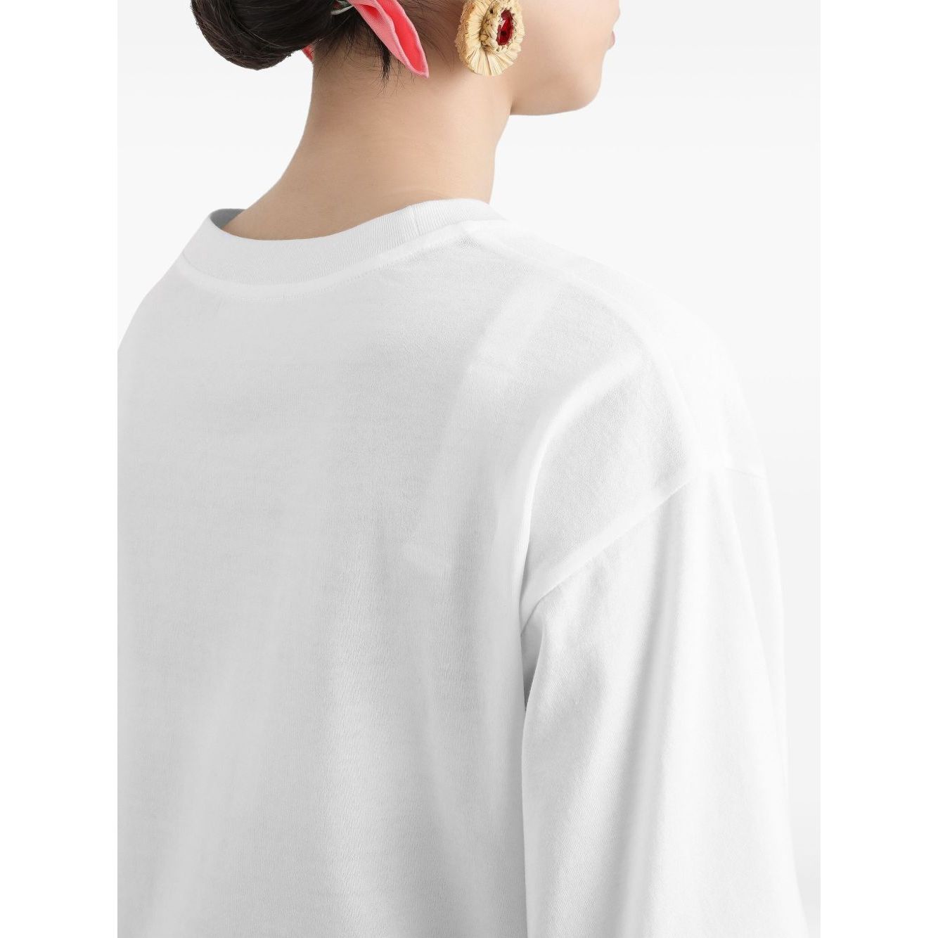 Woman wearing Dolce & Gabbana Logo cotton t-shirt, showing the back design with crew neck and short sleeves.