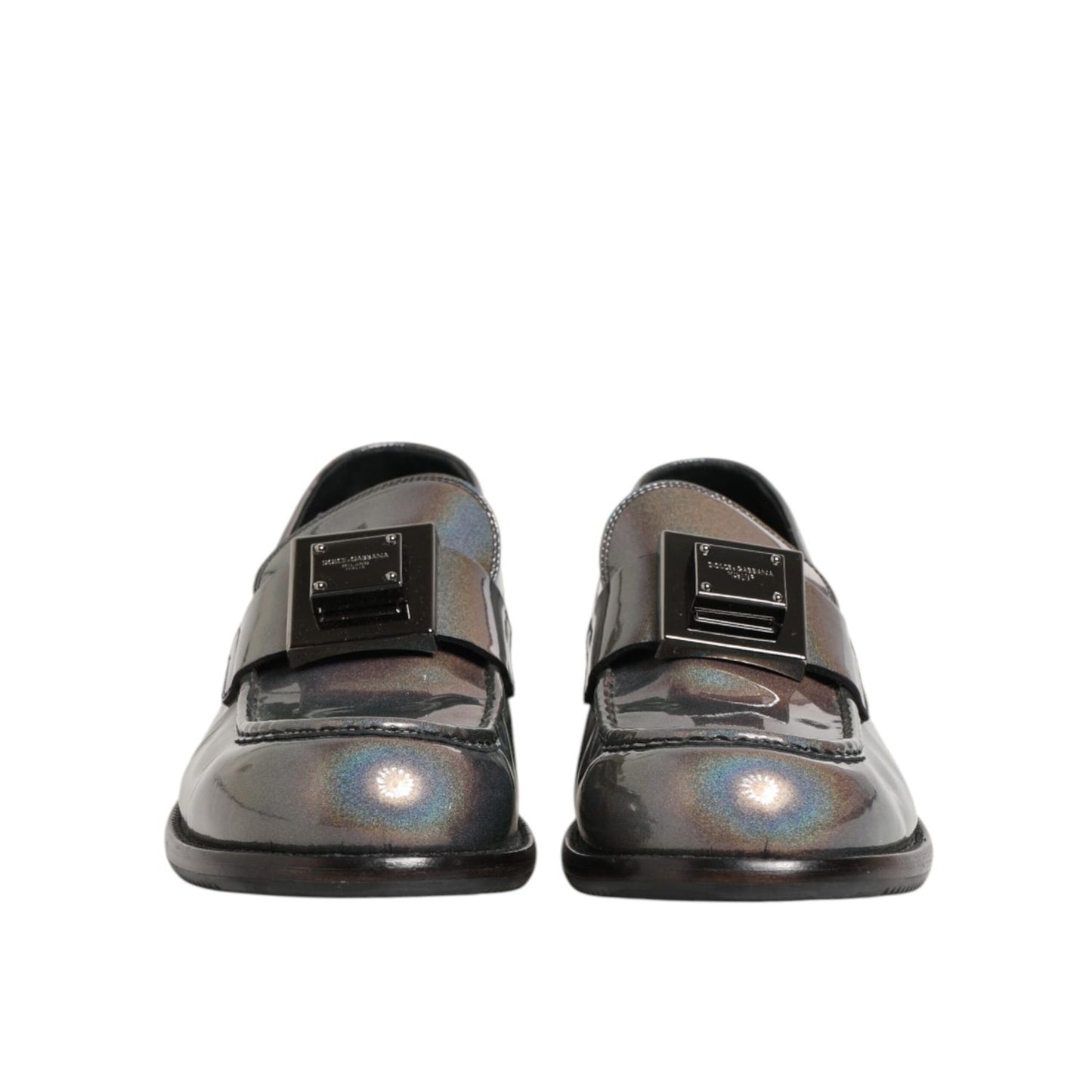 Front view of Dolce & Gabbana Metallic Silver Logo Slip On Men Dress Shoes with DG logo detail.