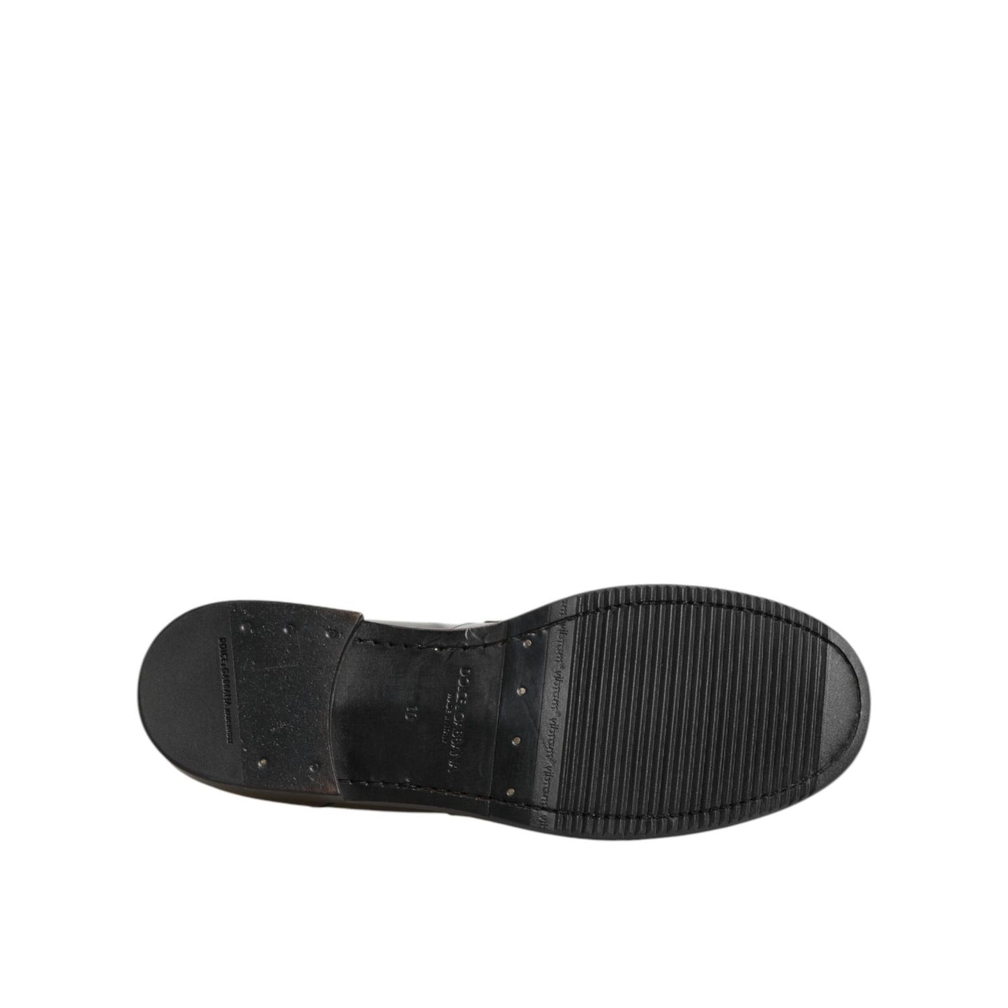 Sole view of Dolce & Gabbana Metallic Silver Logo Slip On Men Dress Shoes, emphasizing design and quality craftsmanship.