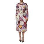 Dolce & Gabbana Multicolor Floral Long Sleeve A-line Dress displayed on a model, showcasing vibrant floral patterns and high craftsmanship.