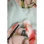 Close-up of Dolce & Gabbana Multicolor Floral Patchwork Ascot Collar Top fabric detail with vibrant floral prints.