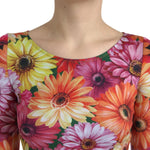 Close-up of Dolce & Gabbana Multicolor Floral Print Sheath Mini Dress with vibrant floral pattern, scoop neckline, featuring pink, orange flowers.