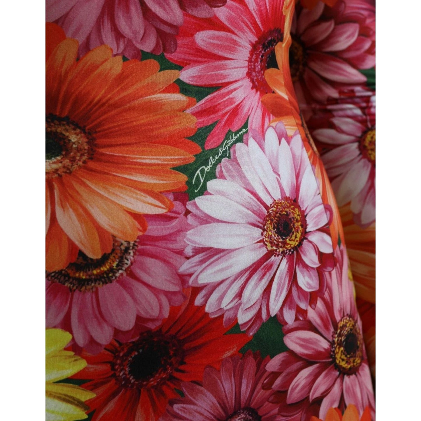 Close-up of Dolce & Gabbana Multicolor Floral Print Sheath Mini Dress featuring vibrant gerbera flower design.