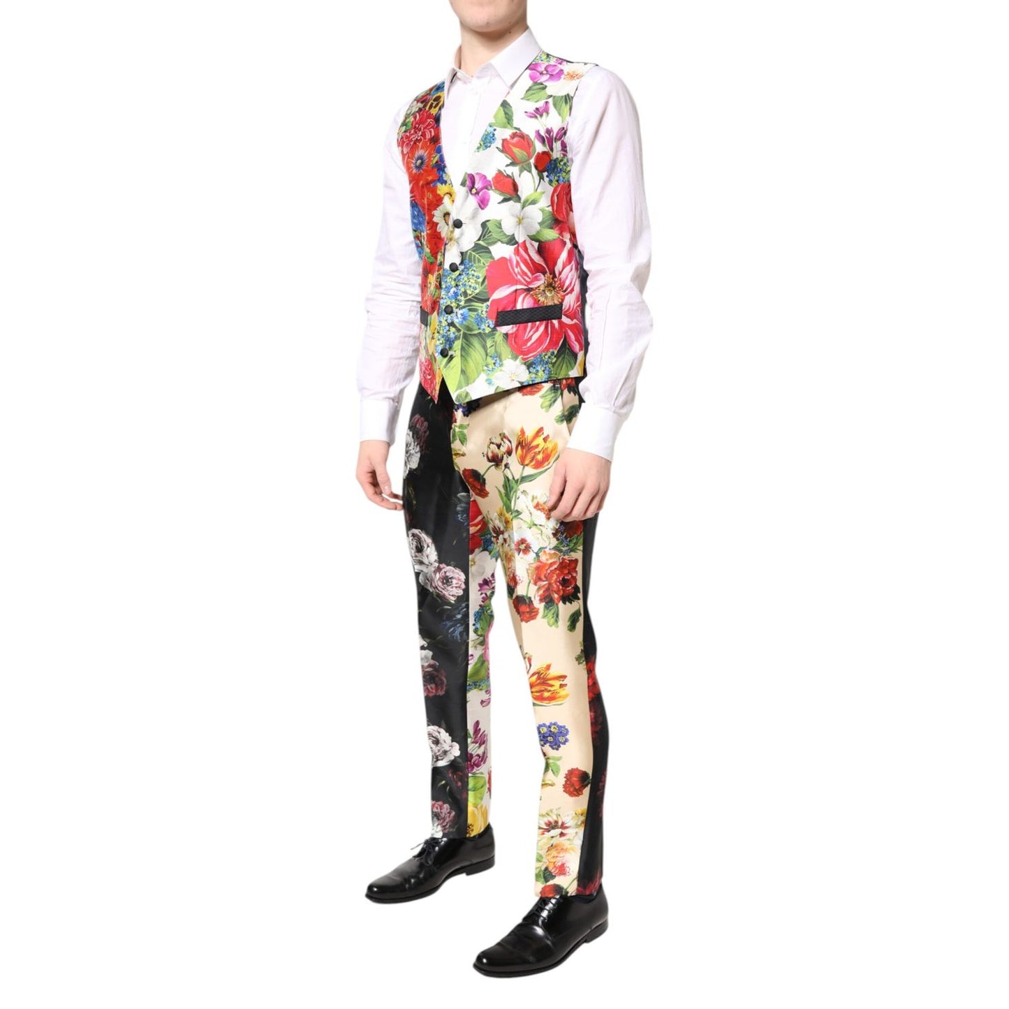 Model wearing Dolce & Gabbana Multicolor Floral SICILIA Silk 3 Piece Suit with vest and pants, showcasing floral pattern and slim fit design.