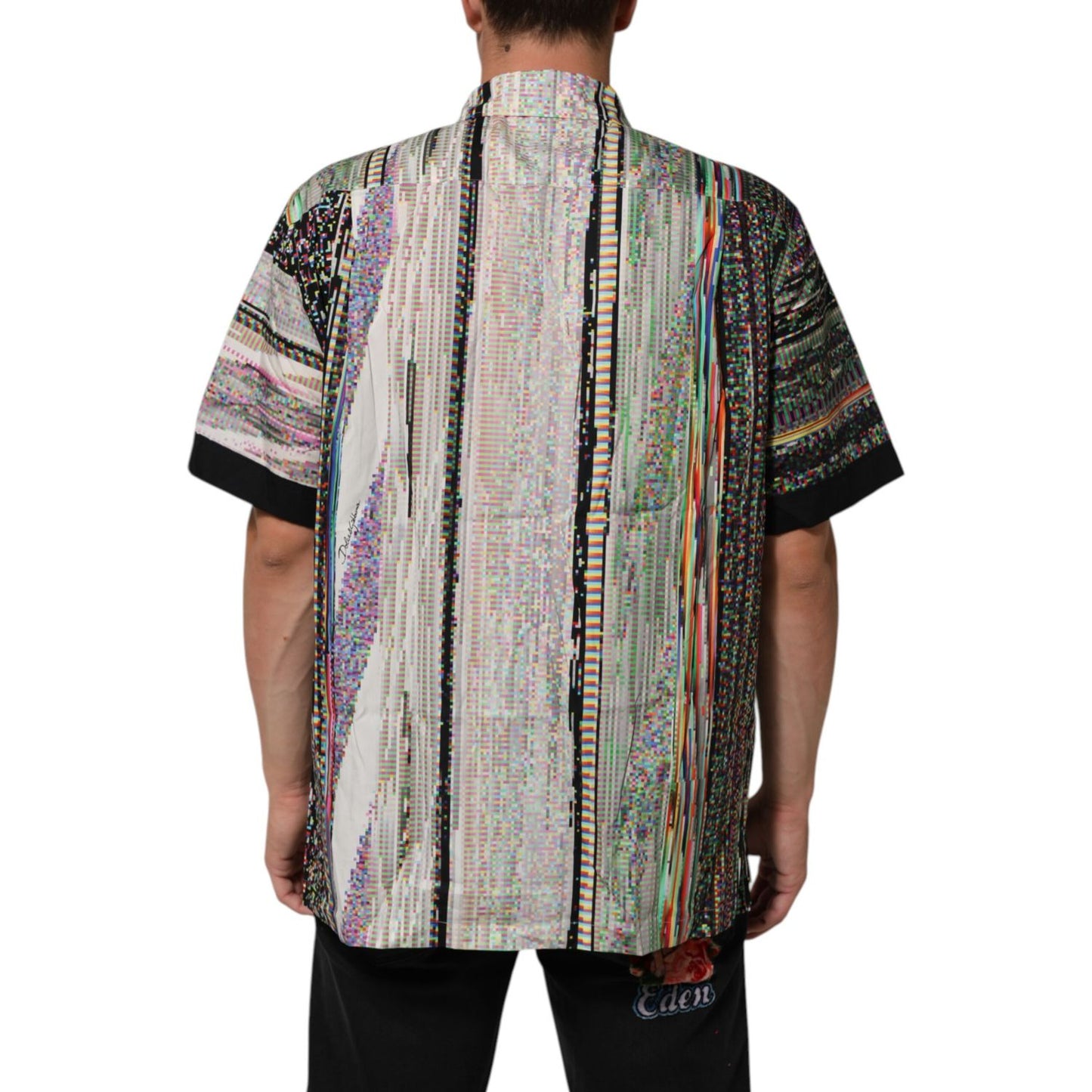 Back view of Dolce & Gabbana Multicolor Graphic Collared Casual Shirt with unique patterns and short sleeves.