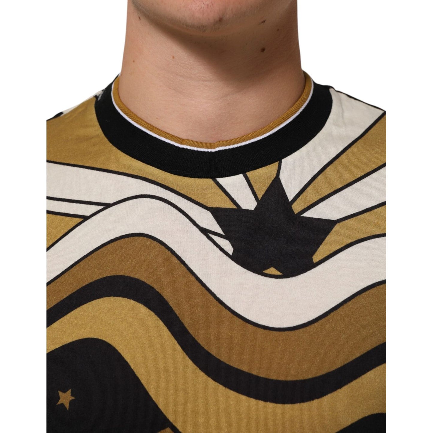 Dolce & Gabbana Multicolor Millennials Star CrewNeck T-shirt detail with star print and wave pattern on soft cotton fabric, close-up view.