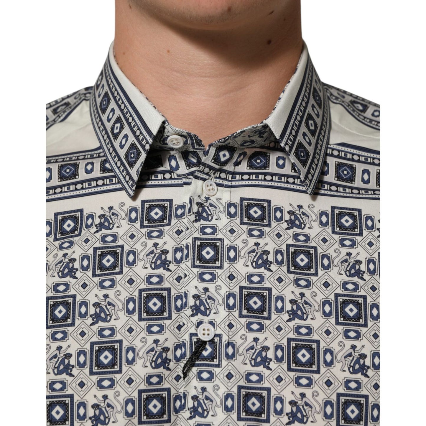 Close-up of Dolce & Gabbana Multicolor Monkey Tie Print GOLD Dress Shirt, showcasing premium cotton fabric and intricate pattern design.