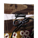 Dolce & Gabbana Multicolor Playing Card Camouflage Shorts Swimwear with heart and club motifs, camouflage waistband and side pockets.