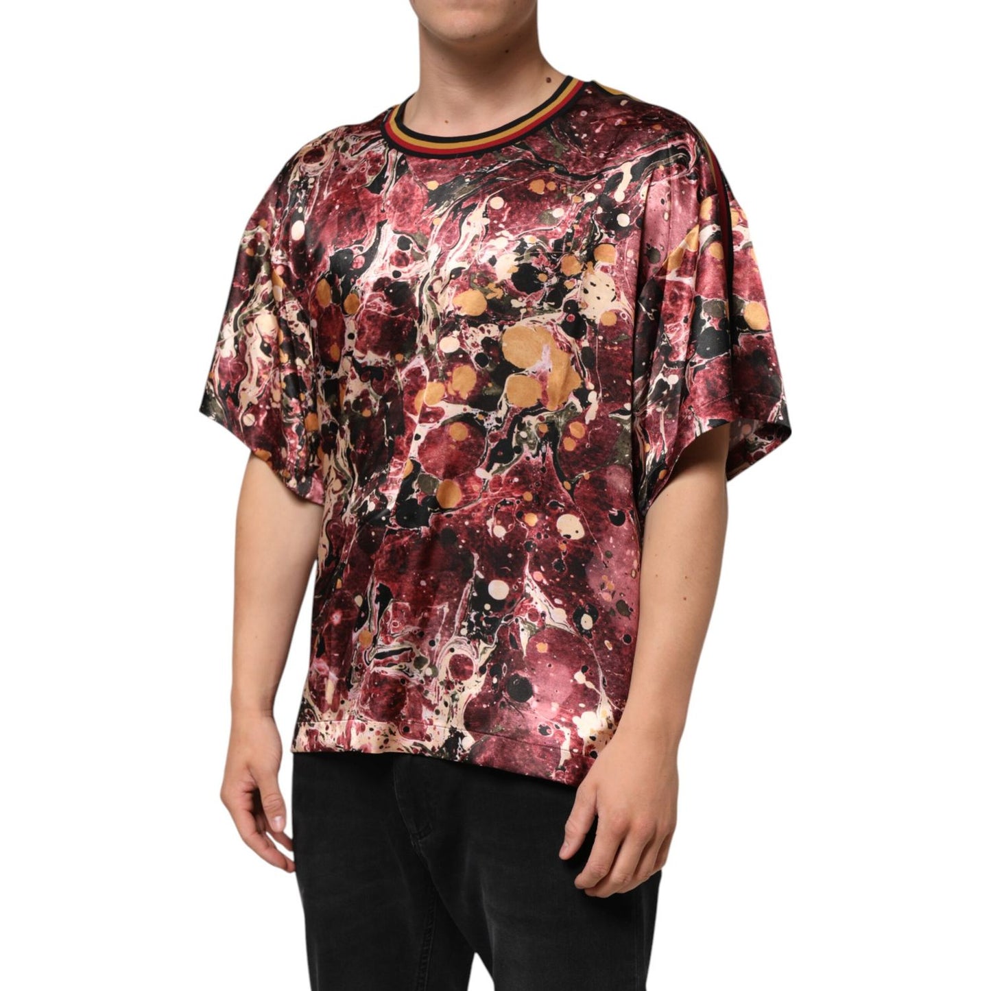 Dolce & Gabbana Multicolor Polyester Marble Print Oversize T-shirt on model, featuring red, black, cream, and gold abstract design.