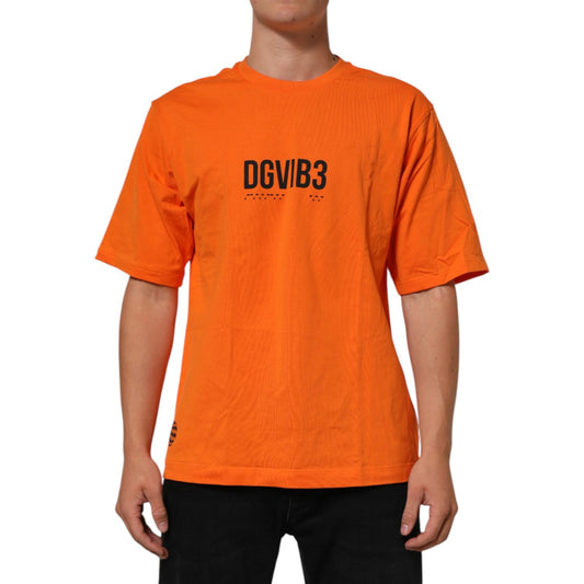 Dolce & Gabbana Orange DGVIB3 Crew Neck Short Sleeves T-shirt featuring bold design on model, made from 100% cotton for a modern look.