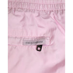 Dolce & Gabbana Pink Nylon Logo Side Stripe Beachwear Men Swimwear shorts showcasing back pocket and brand label