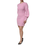 Dolce & Gabbana Pink Polyester Long Sleeves Sheath Mini Dress, front view, model standing wearing the exclusive Italian crafted dress.