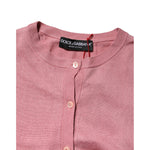 Dolce & Gabbana Pink Silk Cropped Crew Neck Cardigan Sweater with front button closure, preowned with logo, made in Italy.
