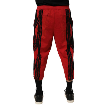 Dolce & Gabbana Red Embroidered Casual Cropped Trouser Pants with intricate black embroidery details, back view.