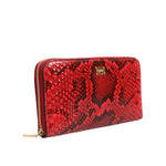 Dolce & Gabbana Red Exotic Leather Zip Around Continental Clutch Wallet made of python with logo plaque and zip fastening.