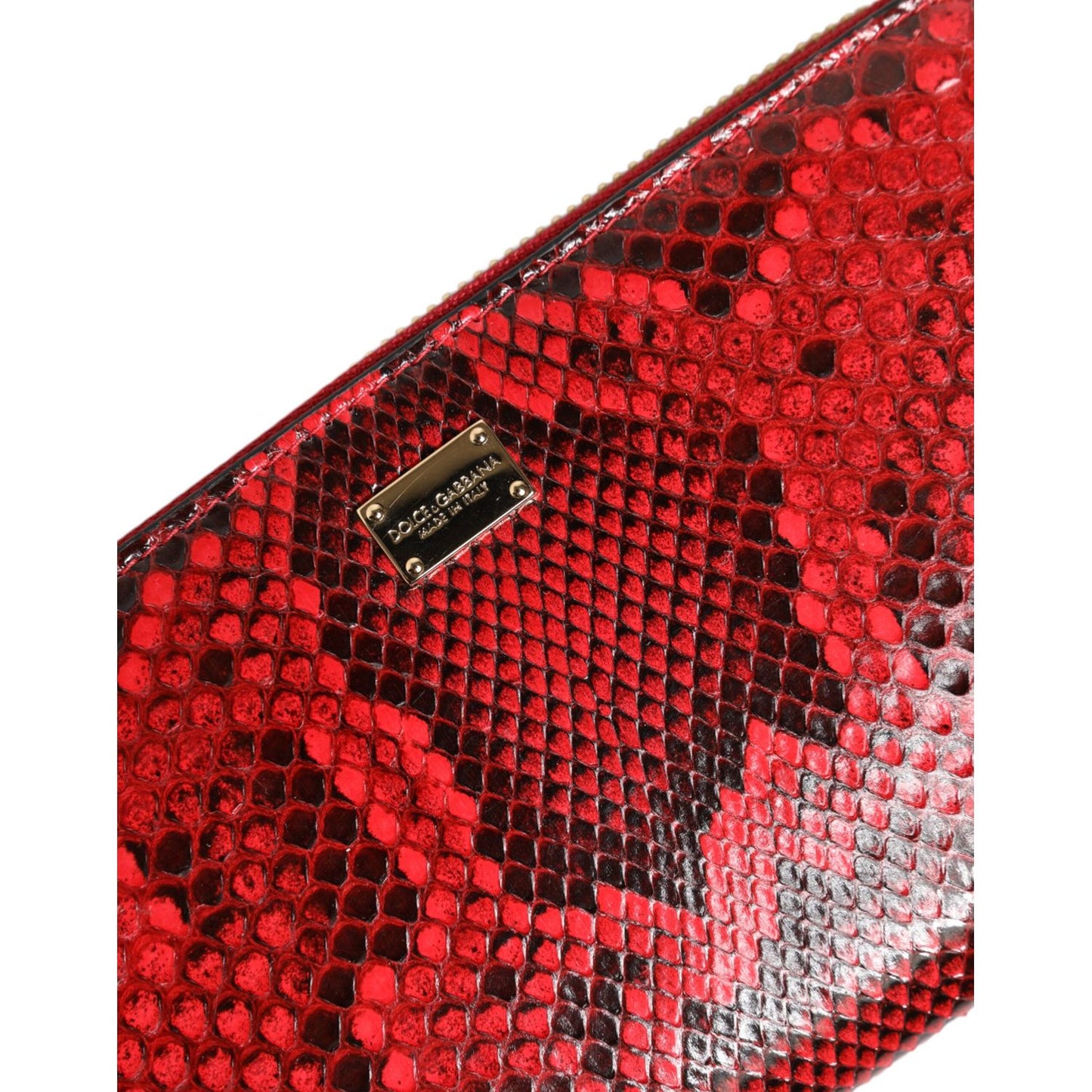 Close-up of Dolce & Gabbana Red Exotic Leather Zip Around Continental Clutch Wallet with logo plaque on python leather.