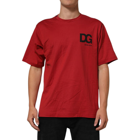 Model wearing Dolce & Gabbana Red Logo Print Cotton Short Sleeve T-shirt, featuring DG logo, crew neck design, made from 100% cotton.