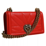 Dolce & Gabbana Red Quilted Devotion Crossbody 11 PRO Phone case bag with gold-tone chain and heart emblem.