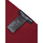 Dolce & Gabbana Red Silk Pocket Square showing brand label and 100% silk composition.