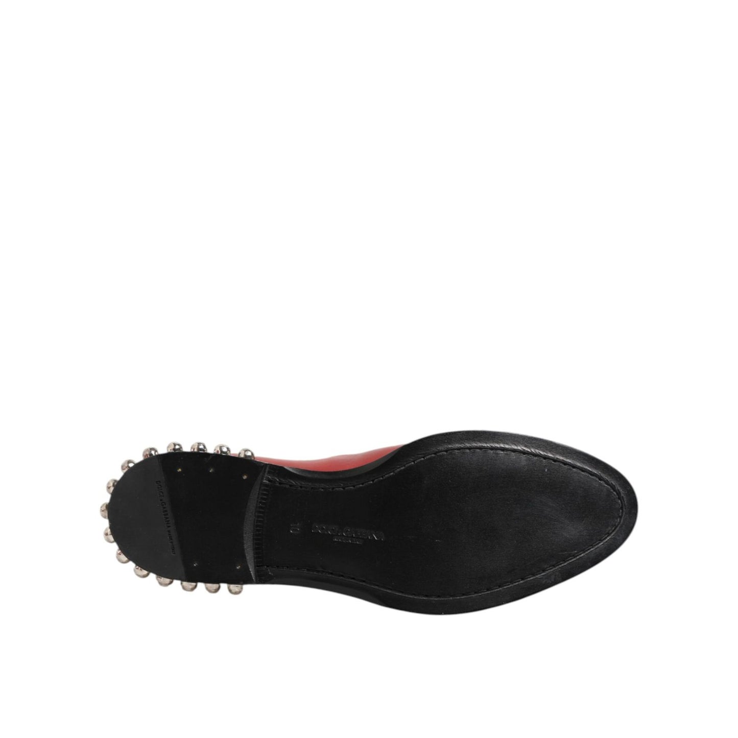 Sole view of Dolce & Gabbana Red Studded Chelsea Short Ankle Boots Shoes highlighting studded heel details.