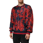 Dolce & Gabbana Silk Navy Red Coral Print Pullover Sweater on model showcasing Mediterranean elegance and Italian style.