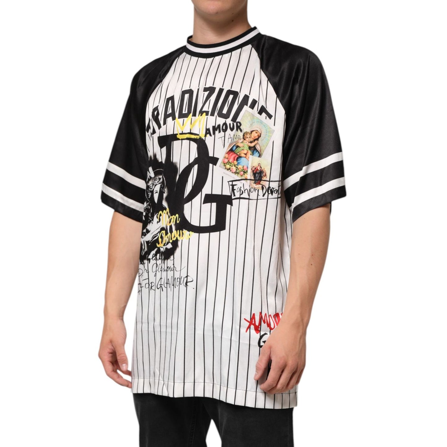 Man wearing Dolce & Gabbana Tradizione Graffiti Print Oversized Men T-shirt, showcasing pinstripe pattern and artistic graffiti graphics.